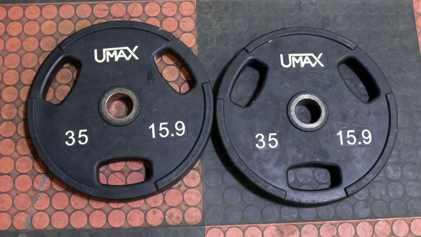 BAILIFF SEIZED: 2X UMAX RUBBER WEIGHT PLATES 35LB