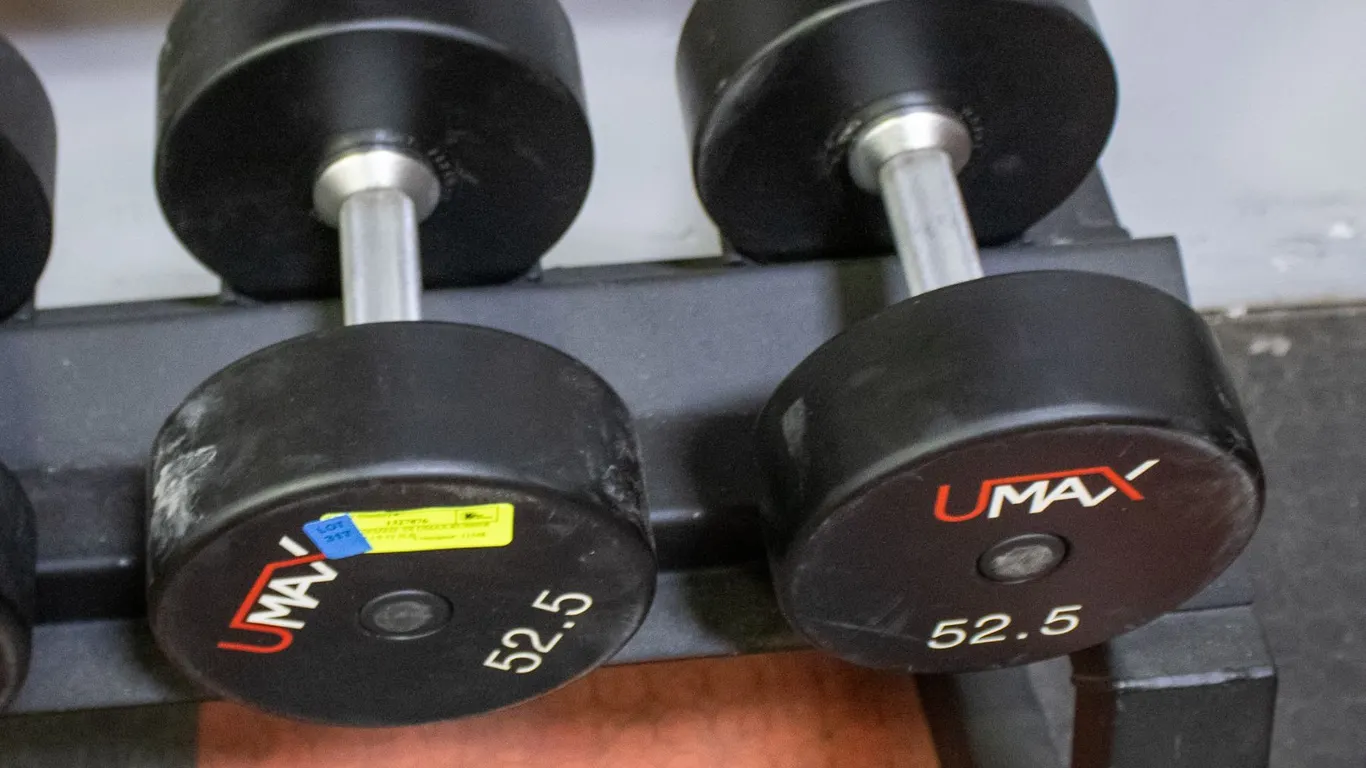BAILIFF SEIZED: 2X UMAX RUBBER DUMBBELLS 52.5LB