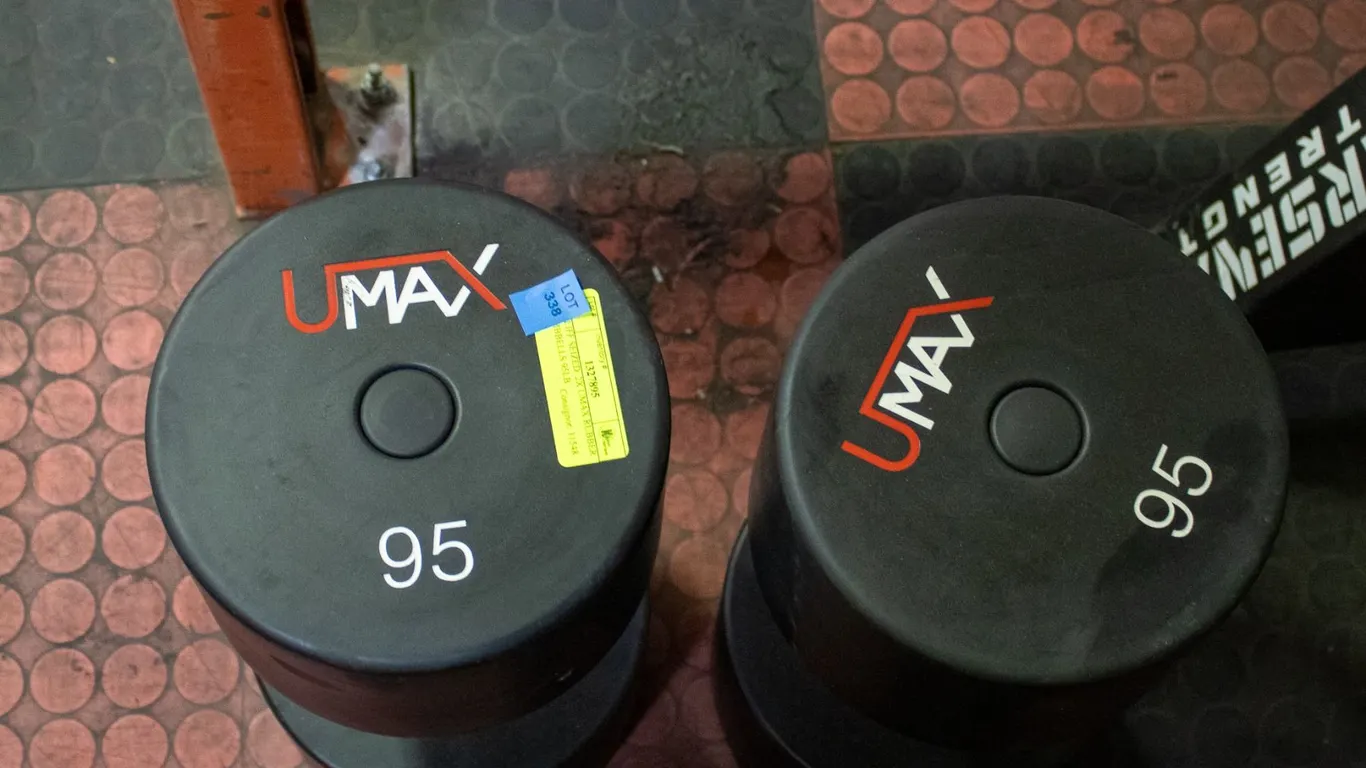 BAILIFF SEIZED: 2X UMAX RUBBER DUMBBELLS 95LB