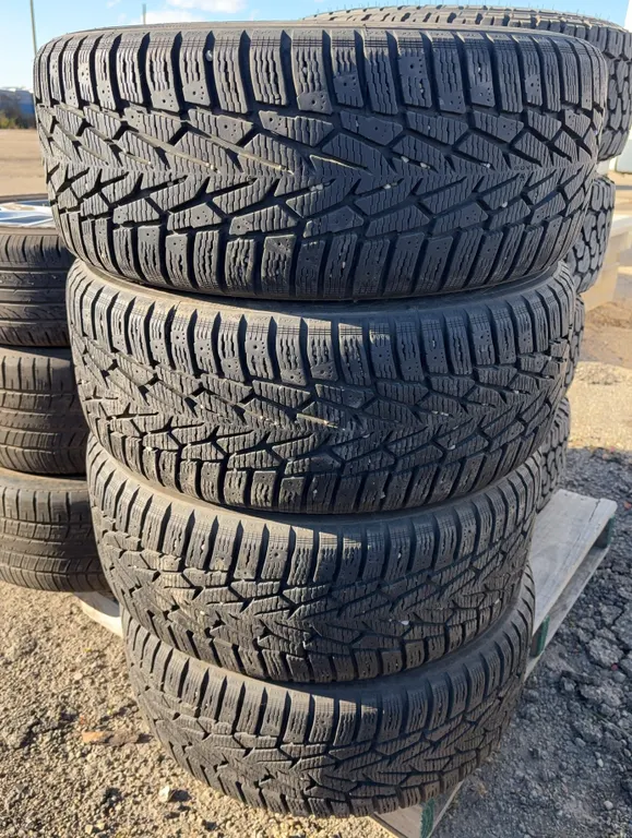 Set of 4 Nokian Nordman 7 235/55R17 Tires on Ford Alloy Rims