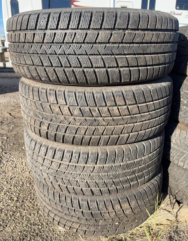 Set of 4 Goodyear WinterCommand Winter Tires on Steel Rims - 235/55R18 100T