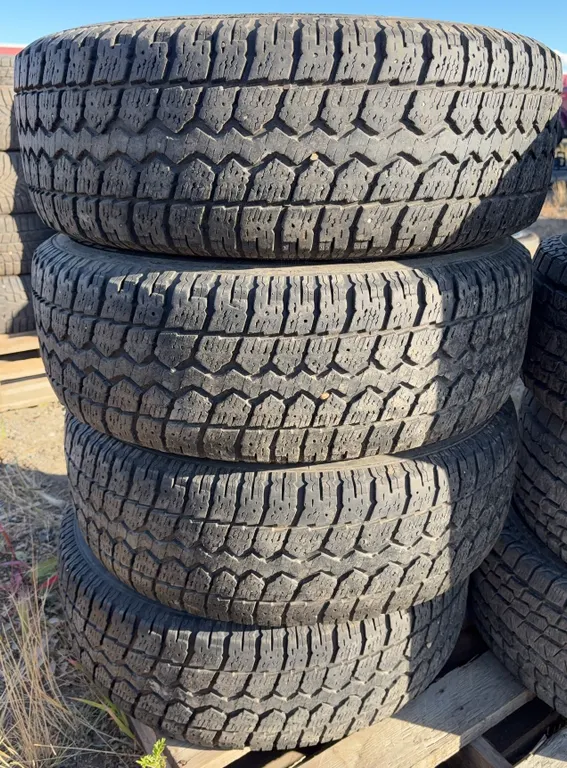 Set of 4 Motomaster Total Terrain Winter Tires on Steel Rims - 215/70R16