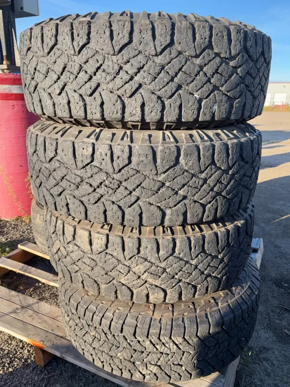 Set of 4 Goodyear Wrangler Duratrac Tires on 8-Bolt Steel Rims - LT245/70R17