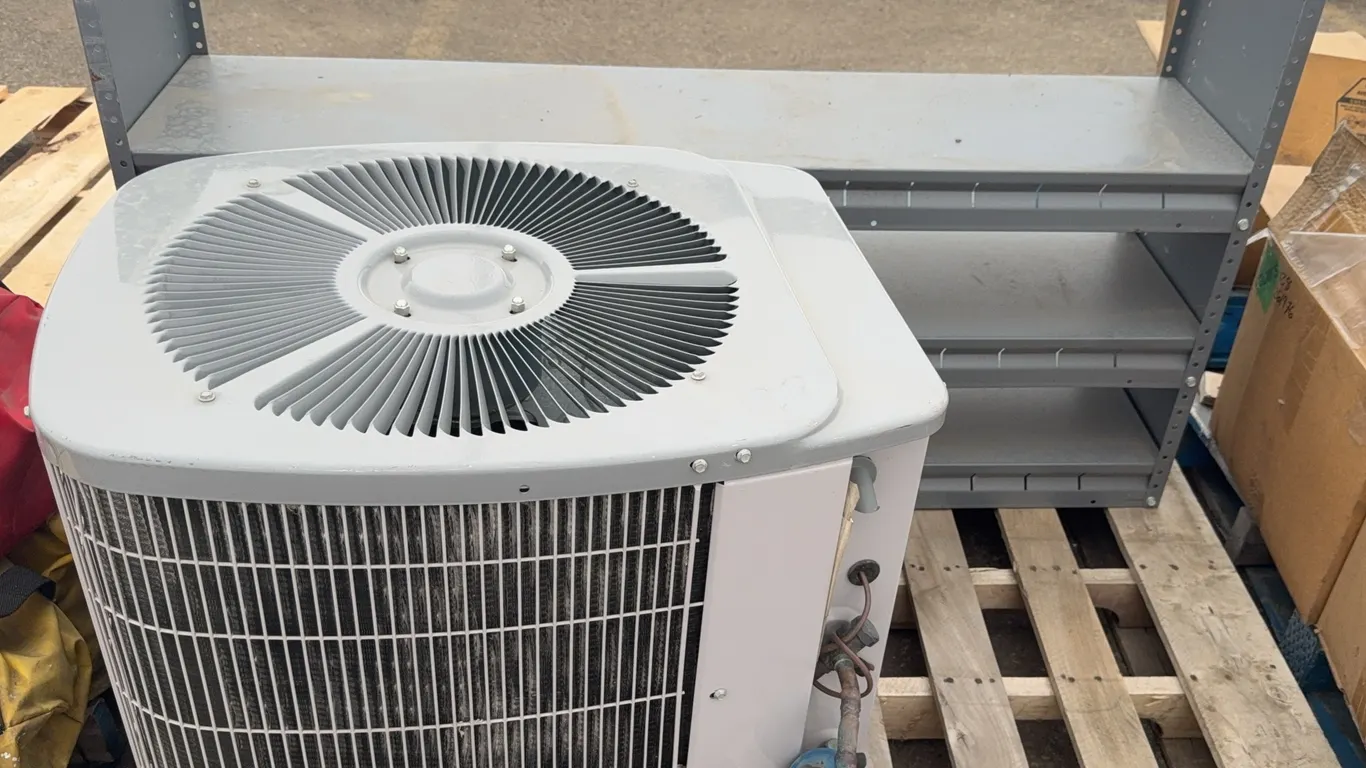 24,000 BTU Central Air Conditioning Condensing Unit (Model 38TKB024320) with Metal Storage Shelving