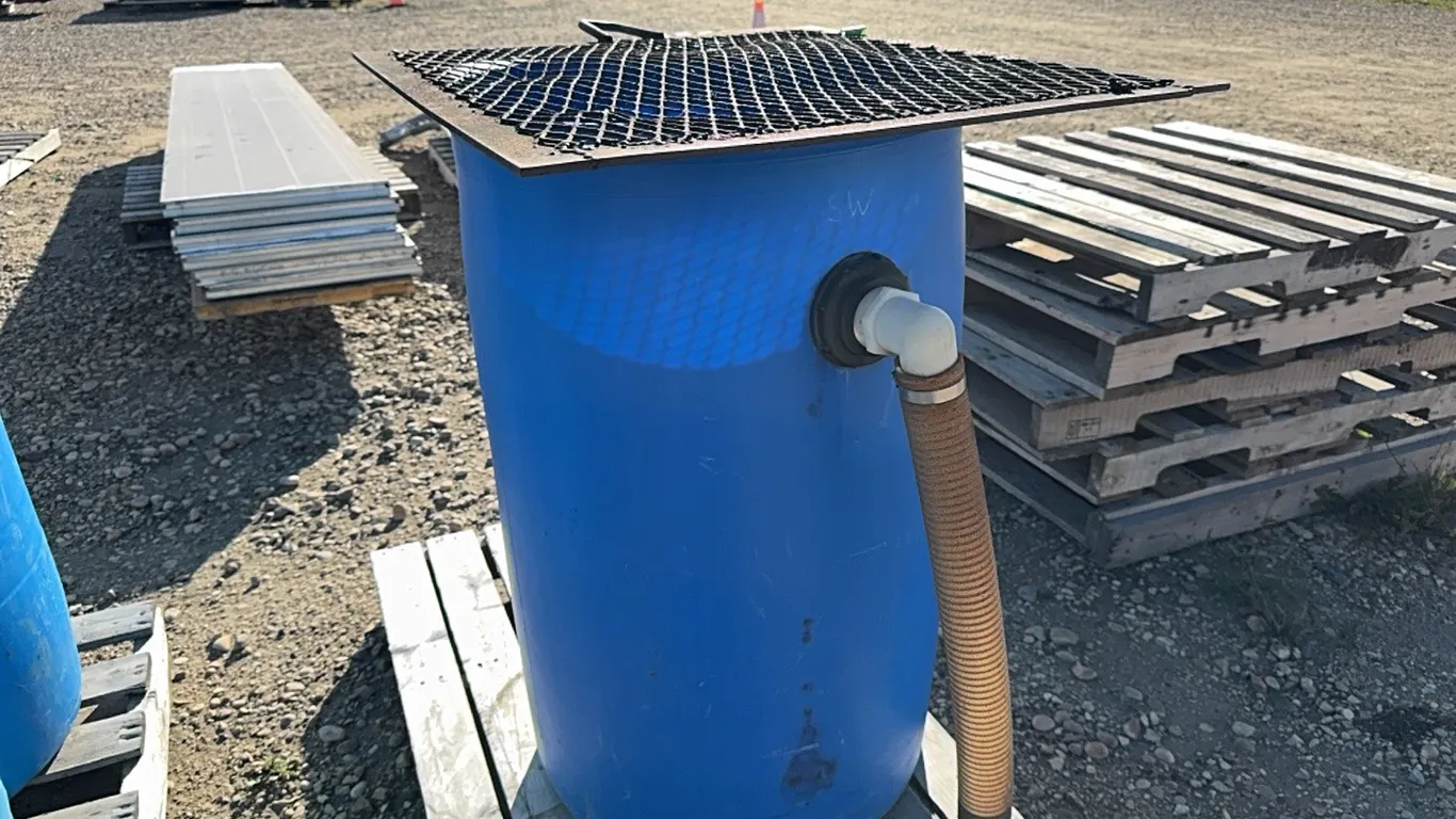 45 Gallon Blue Barrel, Set up to use to Water Trees or Plants, Marked 36 (P10-R7-W-S1955)
