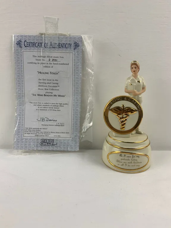 "Healing Touch" First Issue In Nursing & Caring Heirloom Porcelain Music Box Collection By Artist J.B/ Davies, Plays "The Wind Beneath My Wings" with
