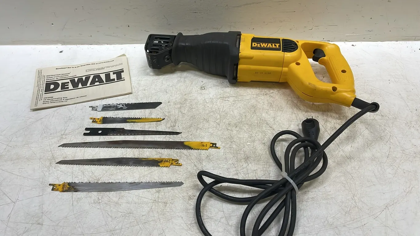 DeWalt Reciprocating Saw, 1 1/8" Stroke, Model DW303M with Extra Blades, Marked 66 (P3-WWT2-S11)