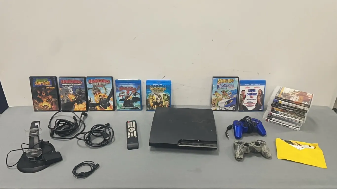 PS3 Game Console, 2 Controllers and Assorted Games & Movies As Per Pictures (P3-EWS3-S49)