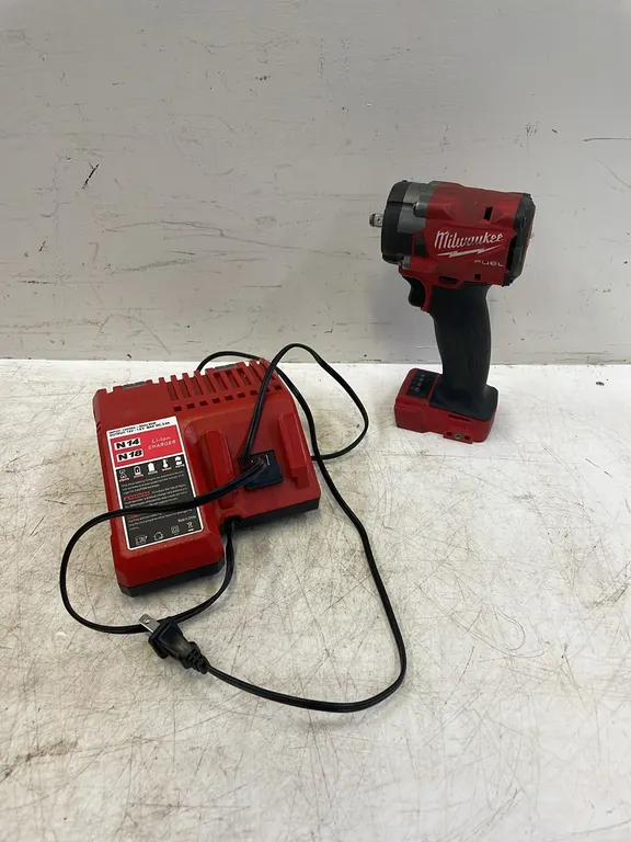 Milwaukee M18 3/8" Impact with Charger, No Battery, Works As Per Seller (P3-R2T8-S732)