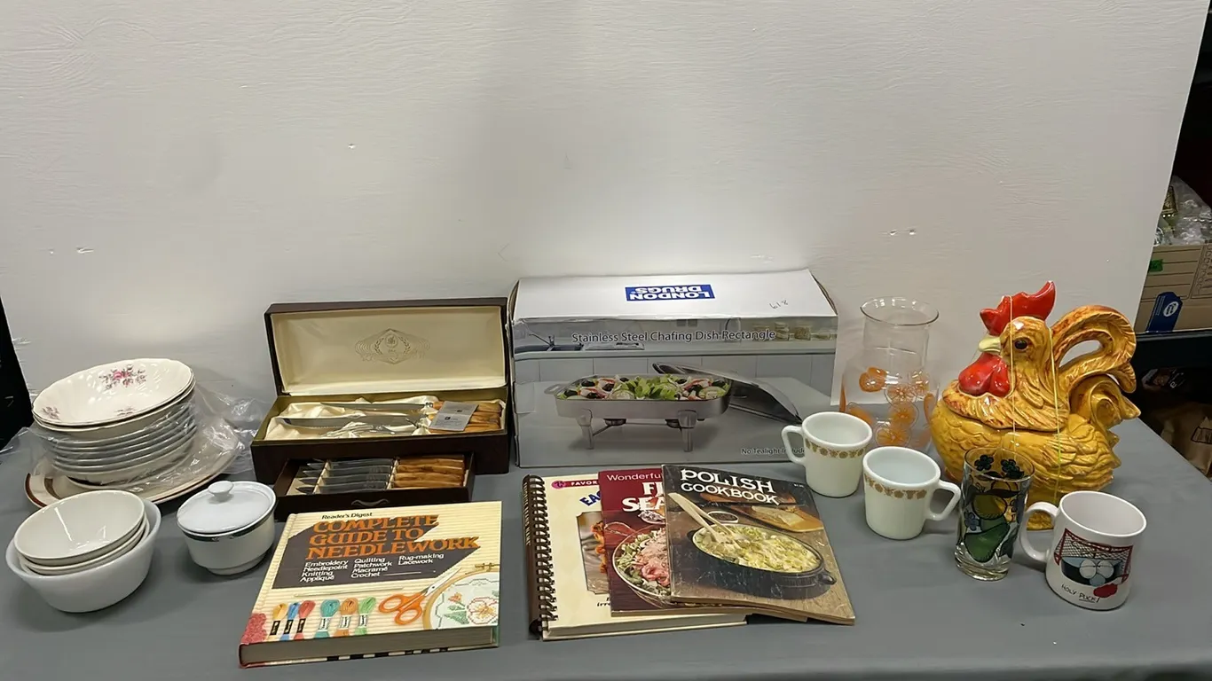 Kitchen Items: Vintage Glo-Hill Bone Handled 9-Piece Knife Set, Vintage Rooster Cookie Jar, Miscellaneous Dishes, Cups, Cookbooks, Needlework Books, G