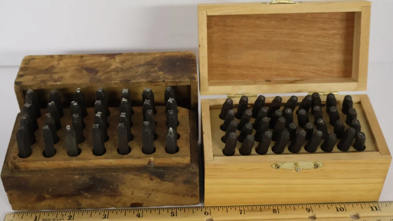 Two Steel Punch Stamp Sets in Wooden Boxes