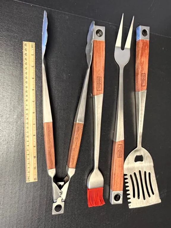Four Stainless Steel Barbecue Tools with Wood Handles