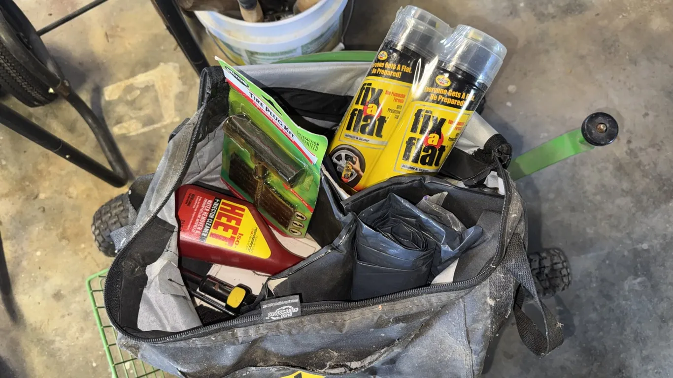 Automotive Utility Bag and Two Cans of Tire Inflator and Sealer, and More