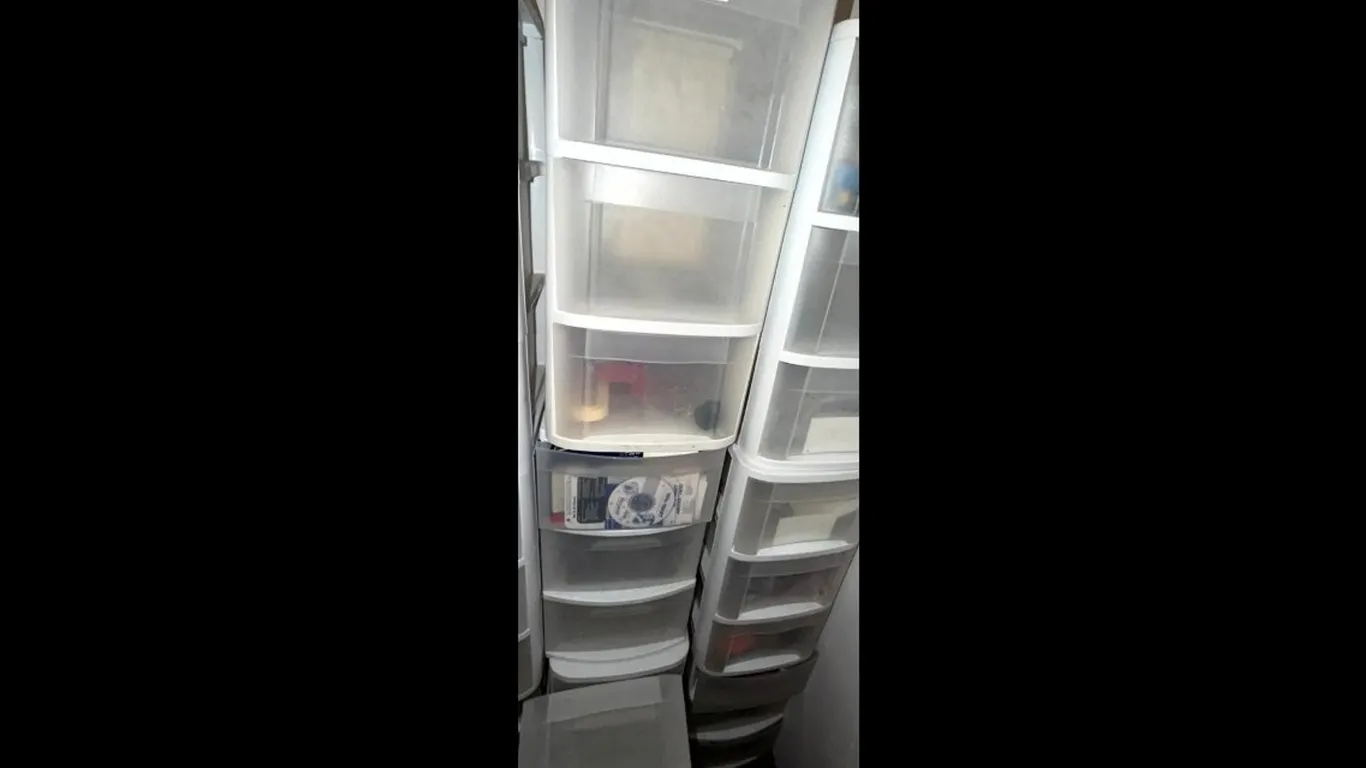 Two White Plastic Storage Drawer with Drawer Contents