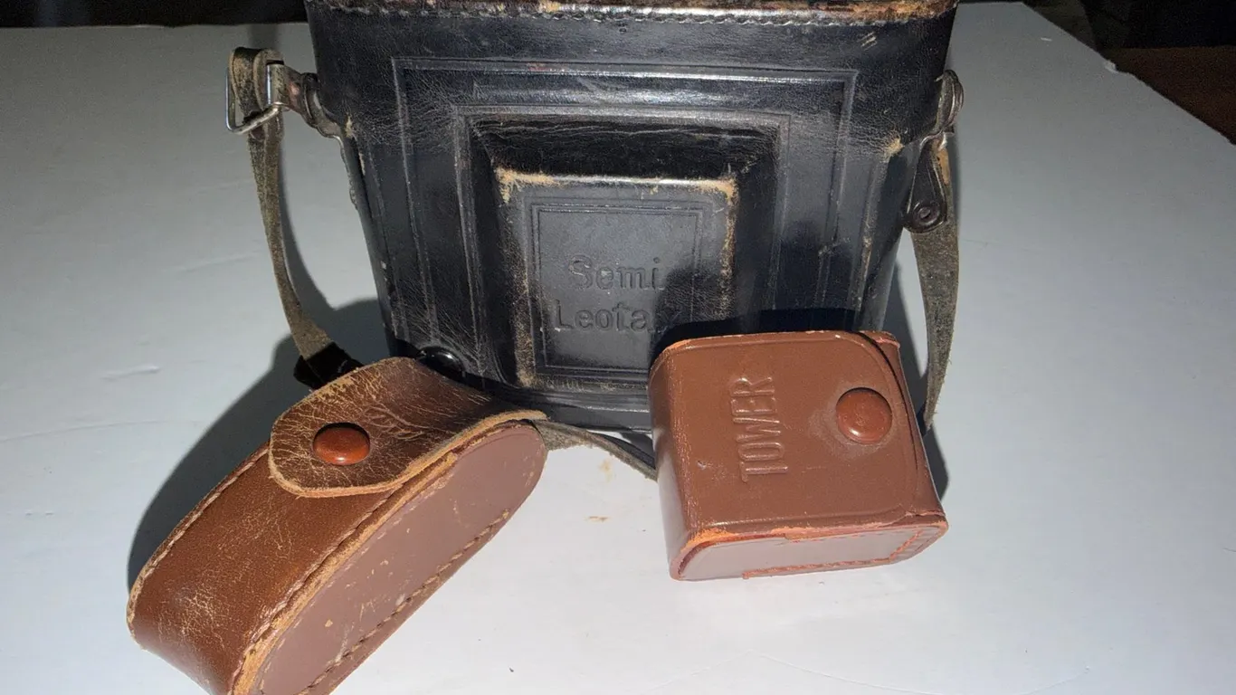 Folding Camera with Leather Case, Exposure Meter, Rangefinder, and Accessory Cases