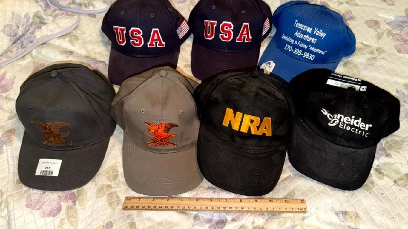 Seven Baseball Caps, Assorted Embroidered Designs