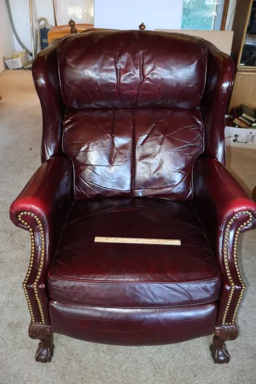 Burgundy Leather Wingback Recliner, Brass Nailhead Trim, Ball and Claw Front Feet