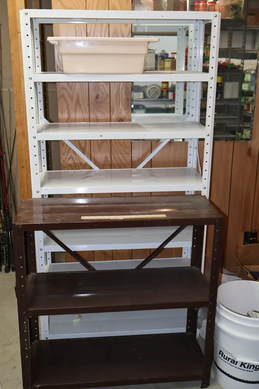 Two Metal Utility Shelving Units and Plastic Tub