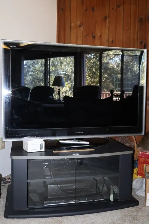 Flat-Screen Television with Media Console Stand, Blu-ray Player, DVD Player, and VCR