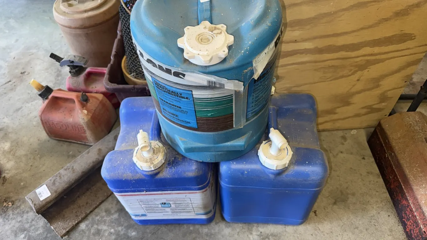 Three Reliance Blue Plastic Water Containers
