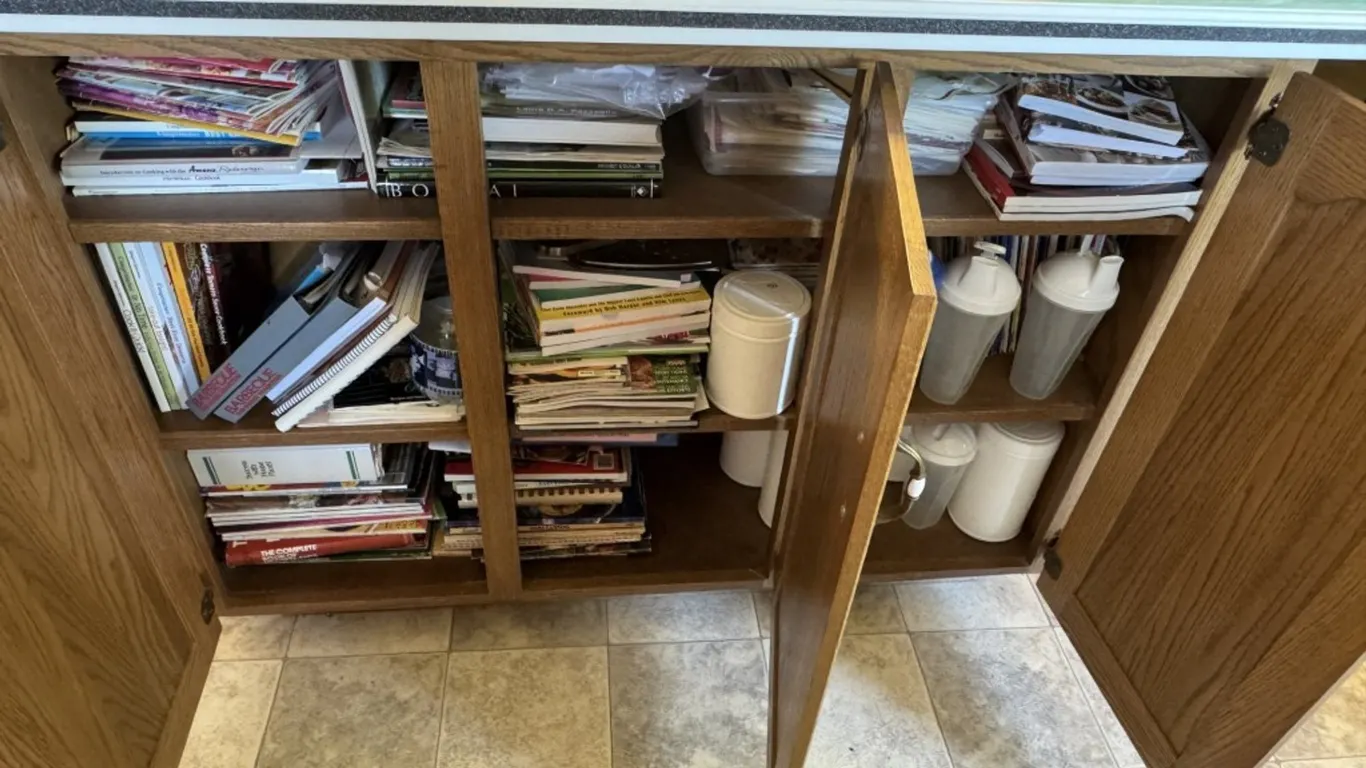 Assorted Cookbooks, Canisters, and Kitchen Items