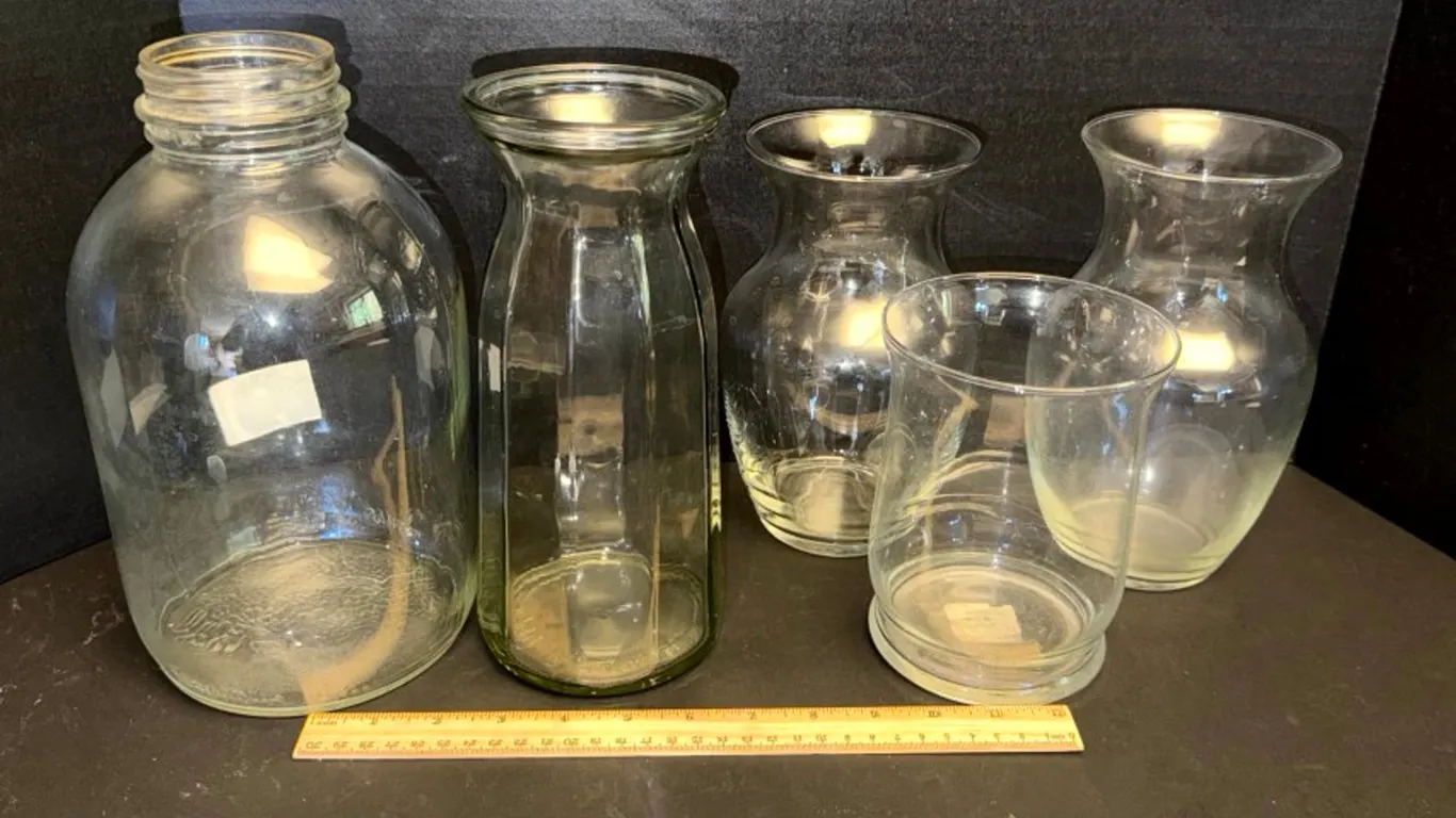 Five Clear Glass Jars and Vases