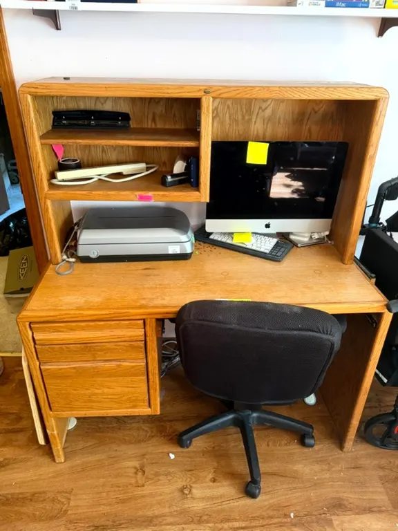 Particle Board Desk 49 x 25 x 56 and Chair, Contents Not Included