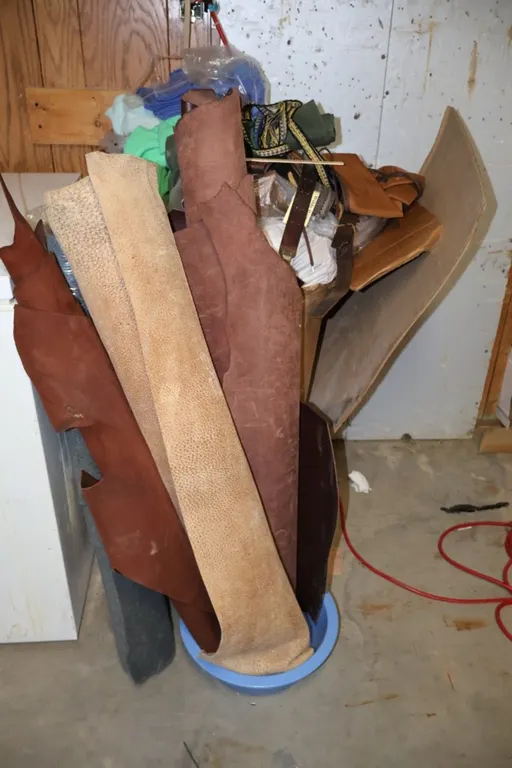 Assorted Leather Hides, Straps, Canvas Bags, and Woven Bands