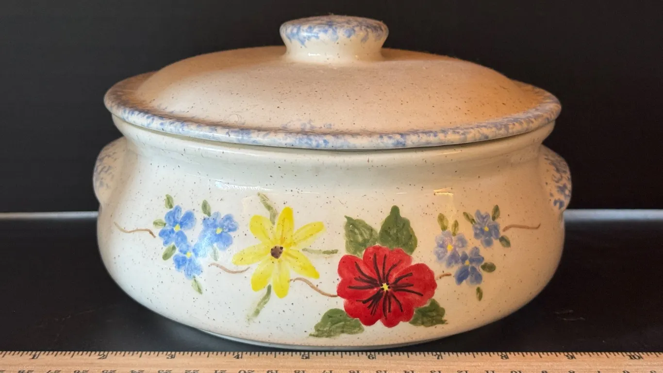 Carousel-Themed Lidded Metal Tin and Floral Ceramic Lidded Casserole Dish
