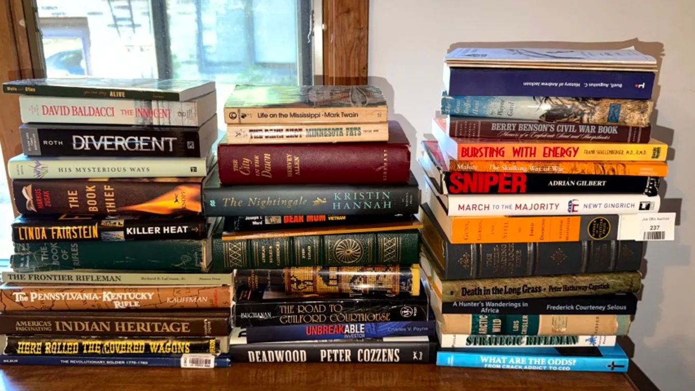 Thirty-Seven Assorted Hardcover and Paperback Books, Firearms, History, Military, and Fiction