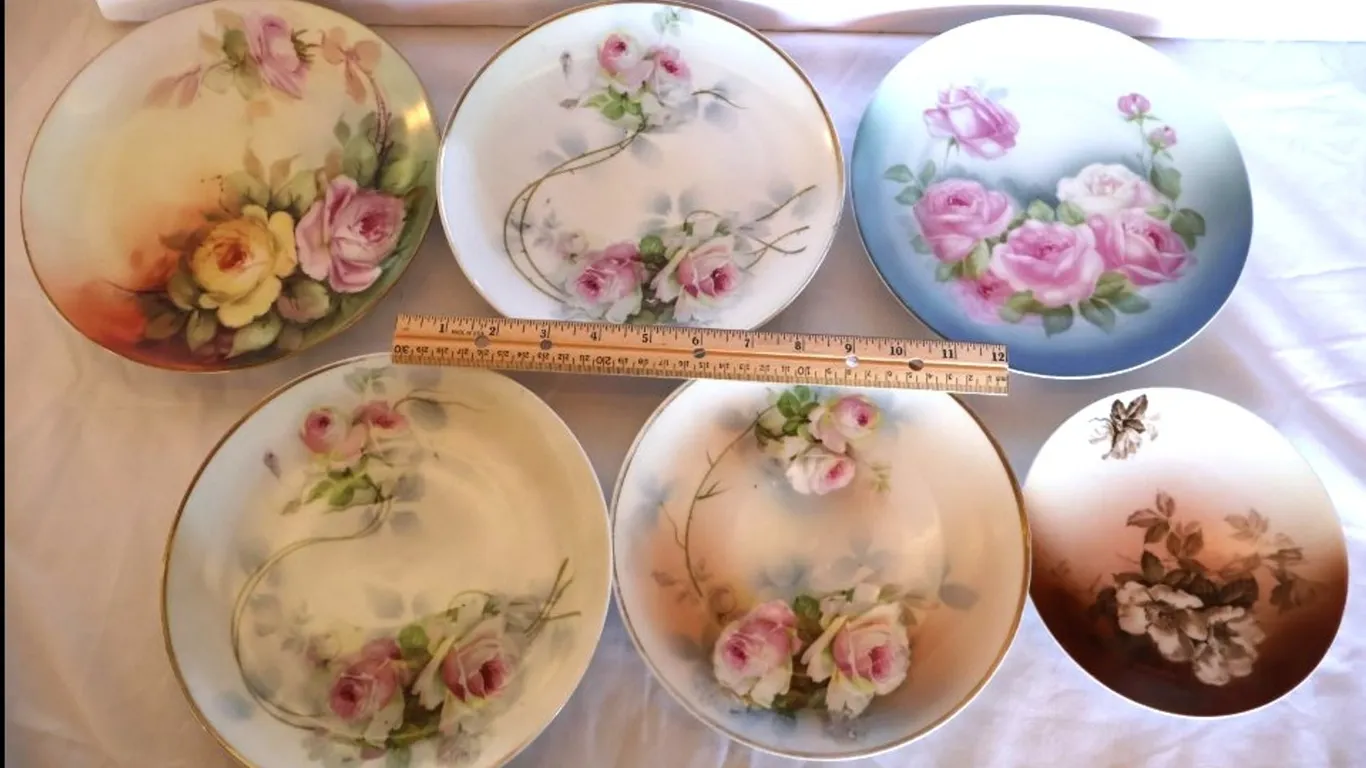 Six Floral Porcelain Plates and Bowls