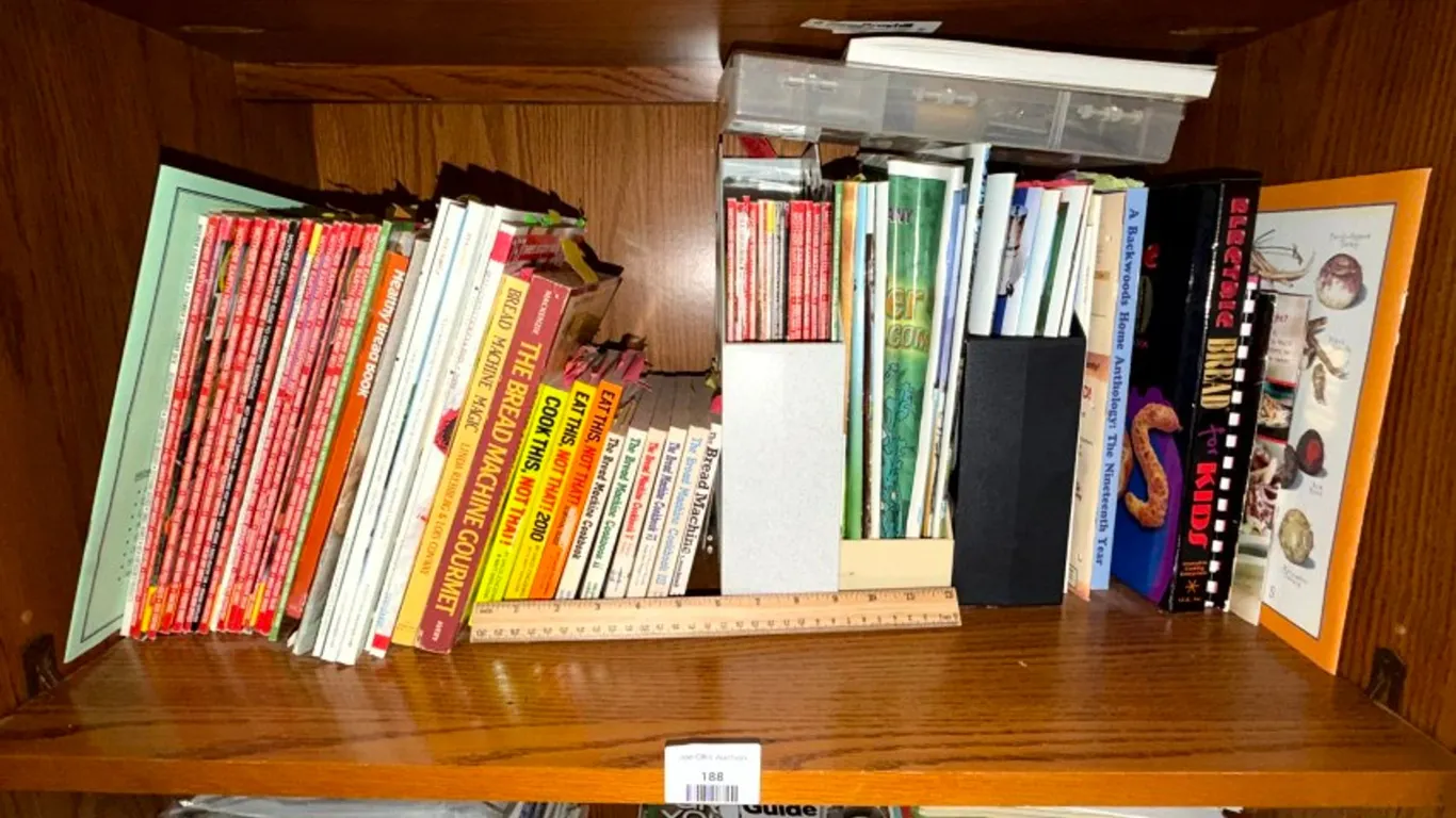 Assorted Cookbooks, Bread Machine Recipe Books, and Mother Earth News Magazines