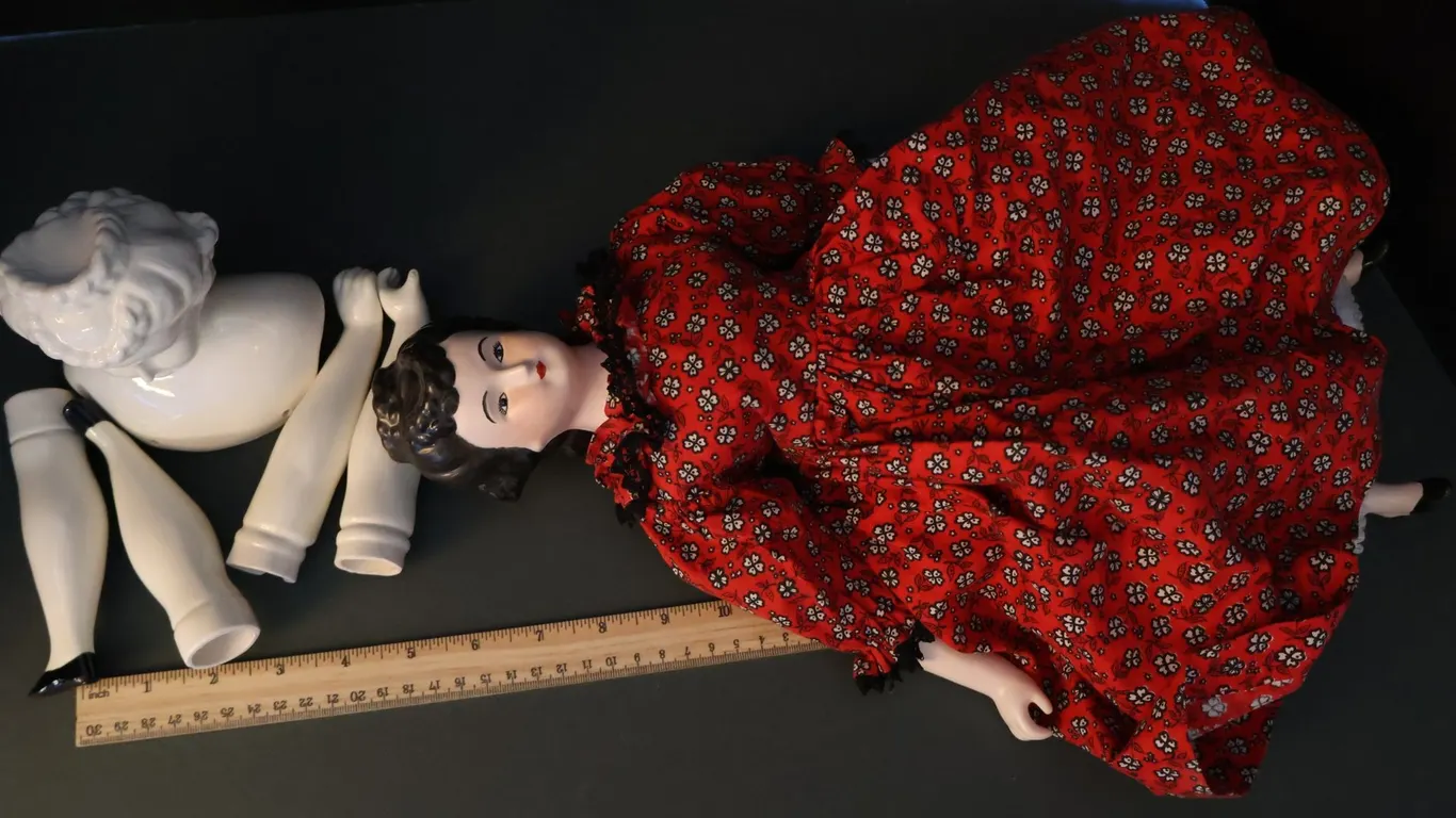 China Head Doll in Red Floral Dress and Porcelain Doll Parts