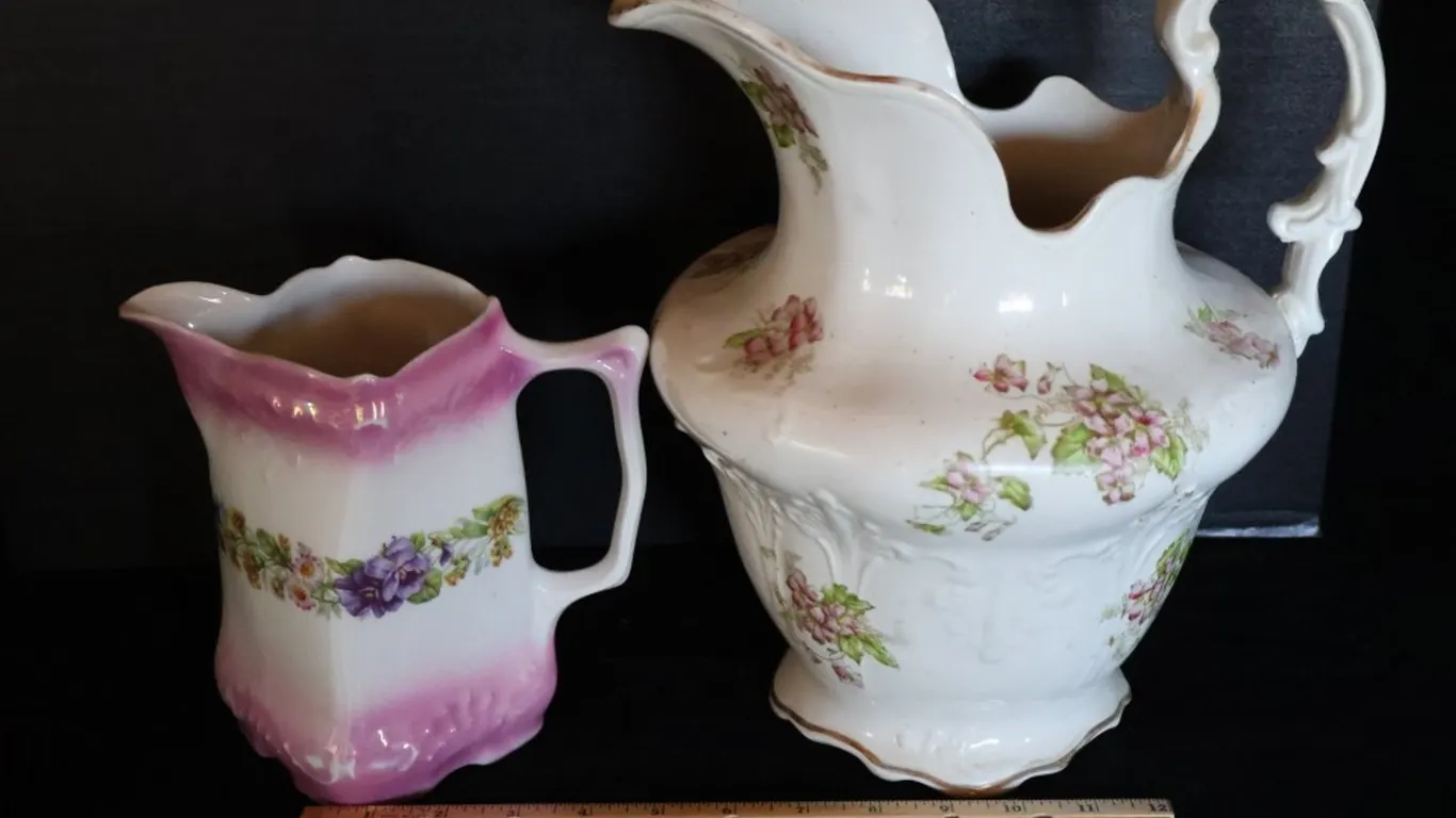Two Floral Ceramic Pitchers