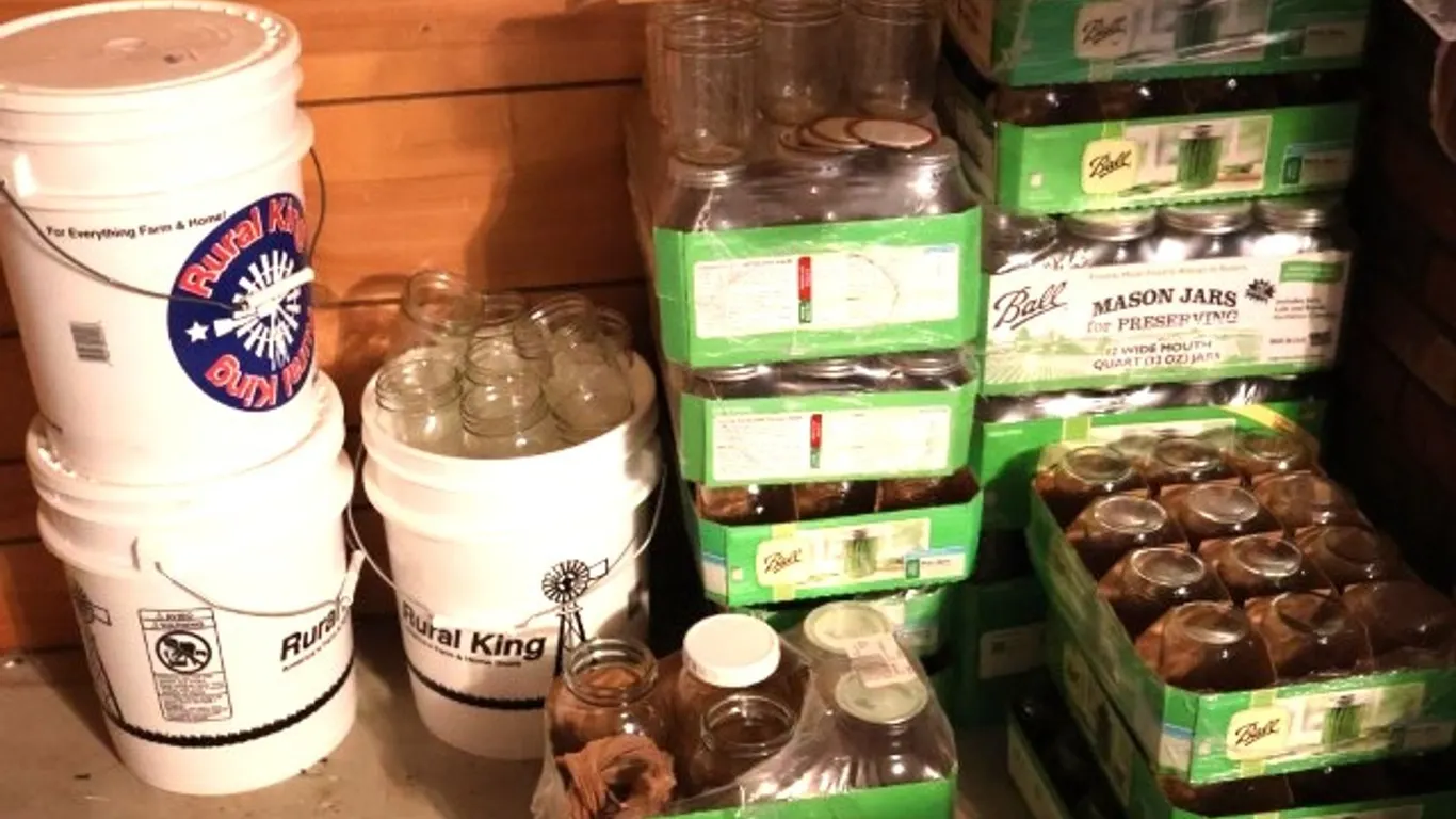 Assorted Glass Canning Jars, Canning Lids, and Plastic Buckets
