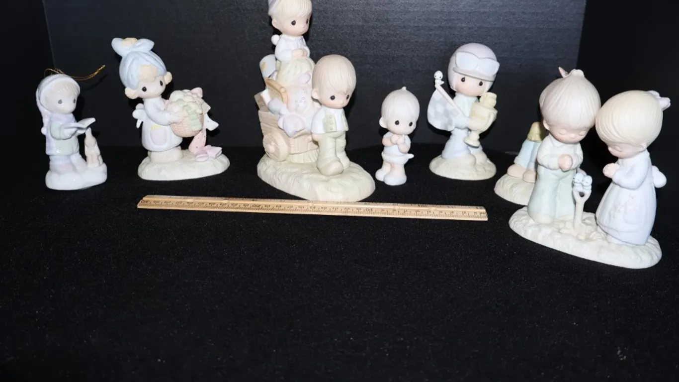 Seven Precious Moments Bisque Porcelain Figurines