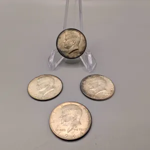 Lot of Four Kennedy Half Dollars