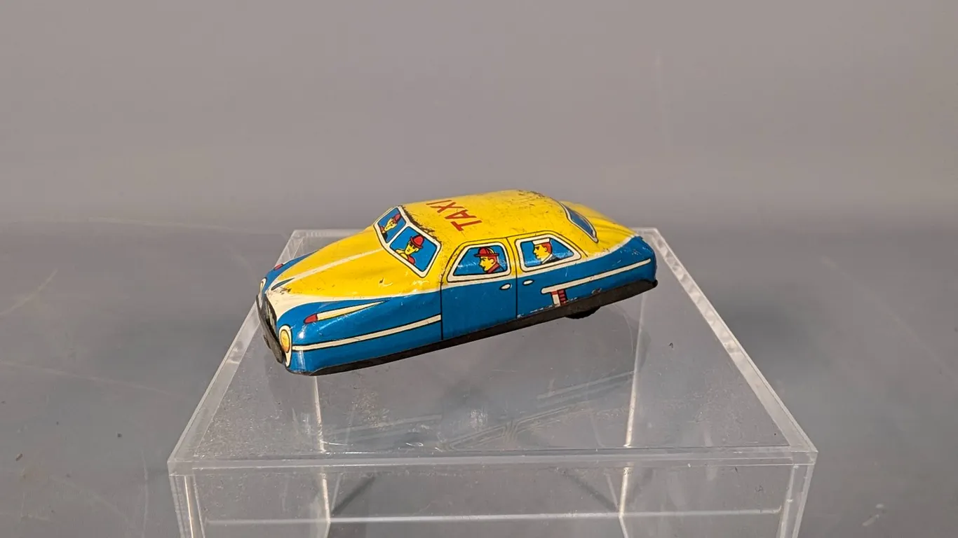 Vintage 1950s Nomura Japanese Tin Friction Taxi Toy Car