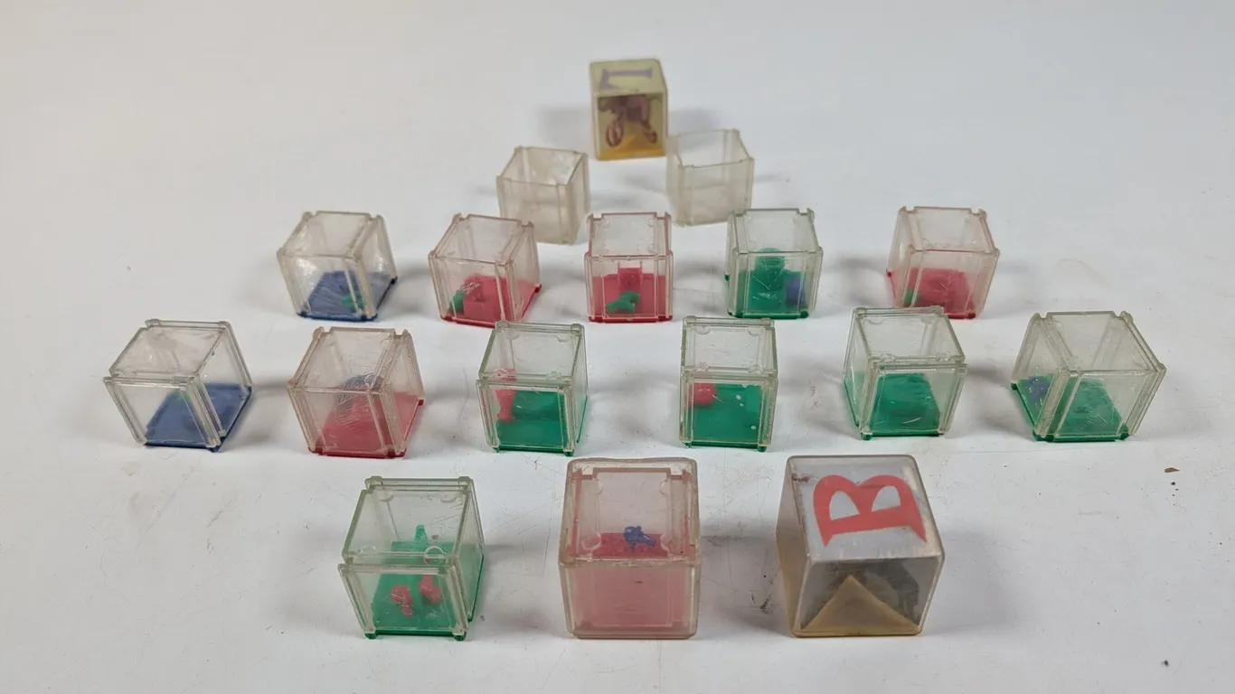 Collection of Vintage Plastic Cube Puzzles and Games
