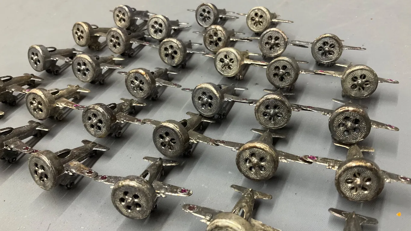 Collection of vintage airplane hummer whistle siren toys