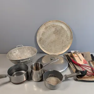 Assorted Vintage Kitchenware Lot with Pans, Colander, and Utensils