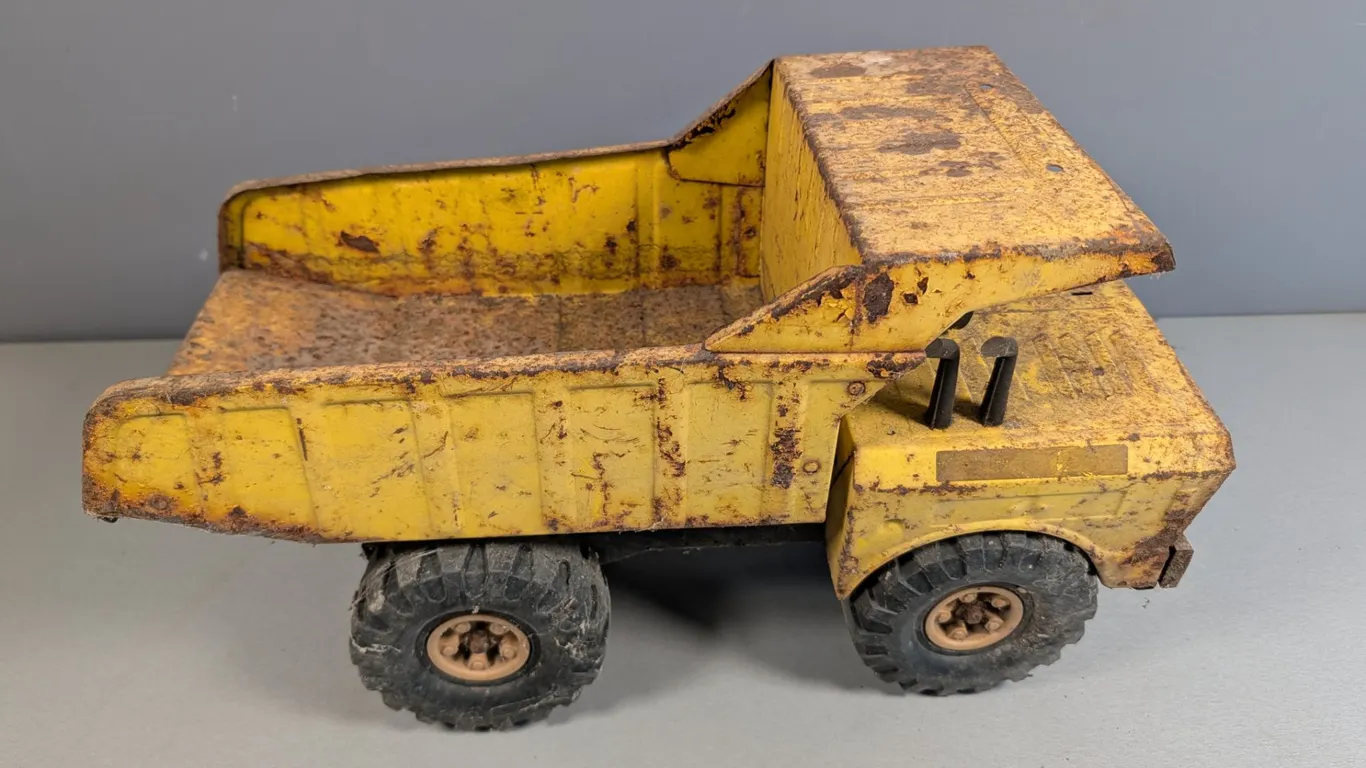 Vintage Yellow Metal Toy Dump Truck