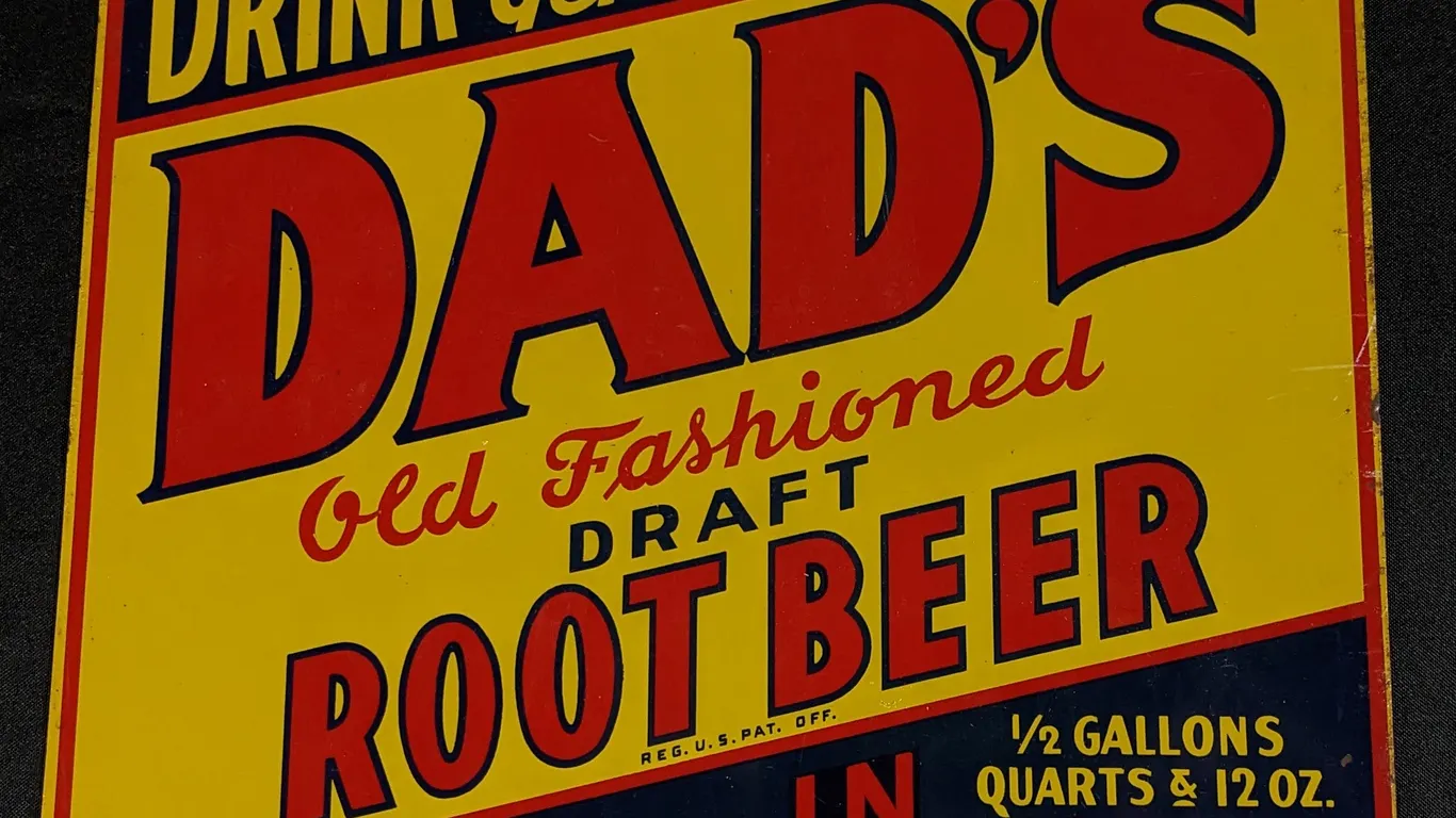 TIN SIGN DRINK GENUINE DAD'S OLD FASHIONED DRAFT ROOT BEER