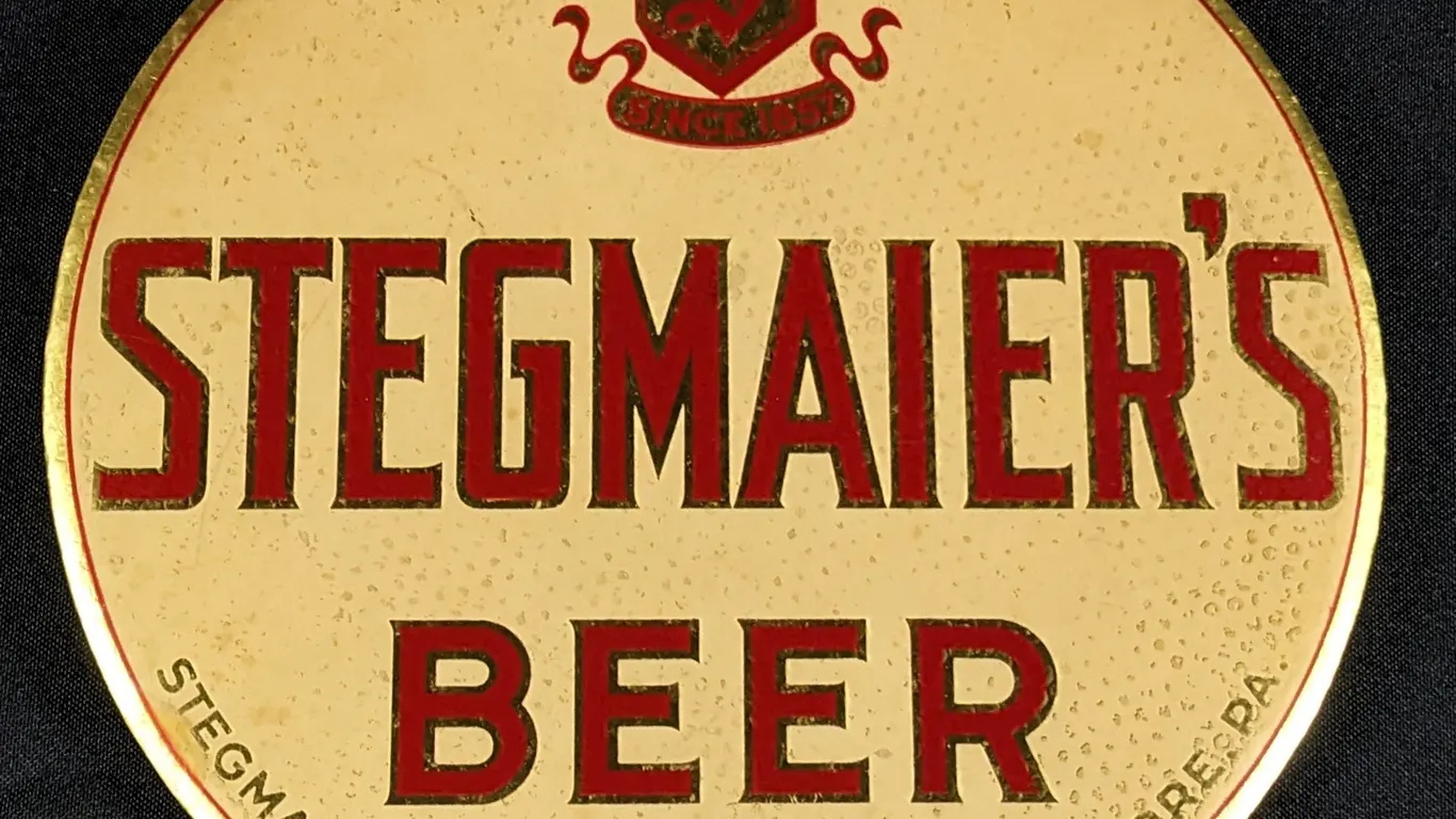 CELLULOID OVER TIN SIGN STEGMAIER'S BER WILKES BARRE PENNSYLVANIA