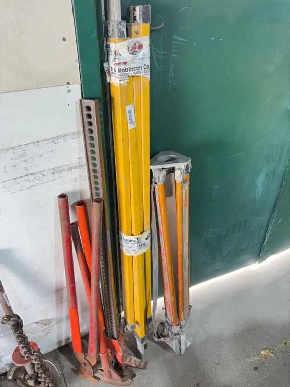 Assorted Lot of Pipe Bender, Jacks, Levels, Tripods