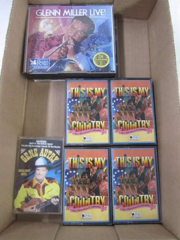Assorted Cassettes And CDs