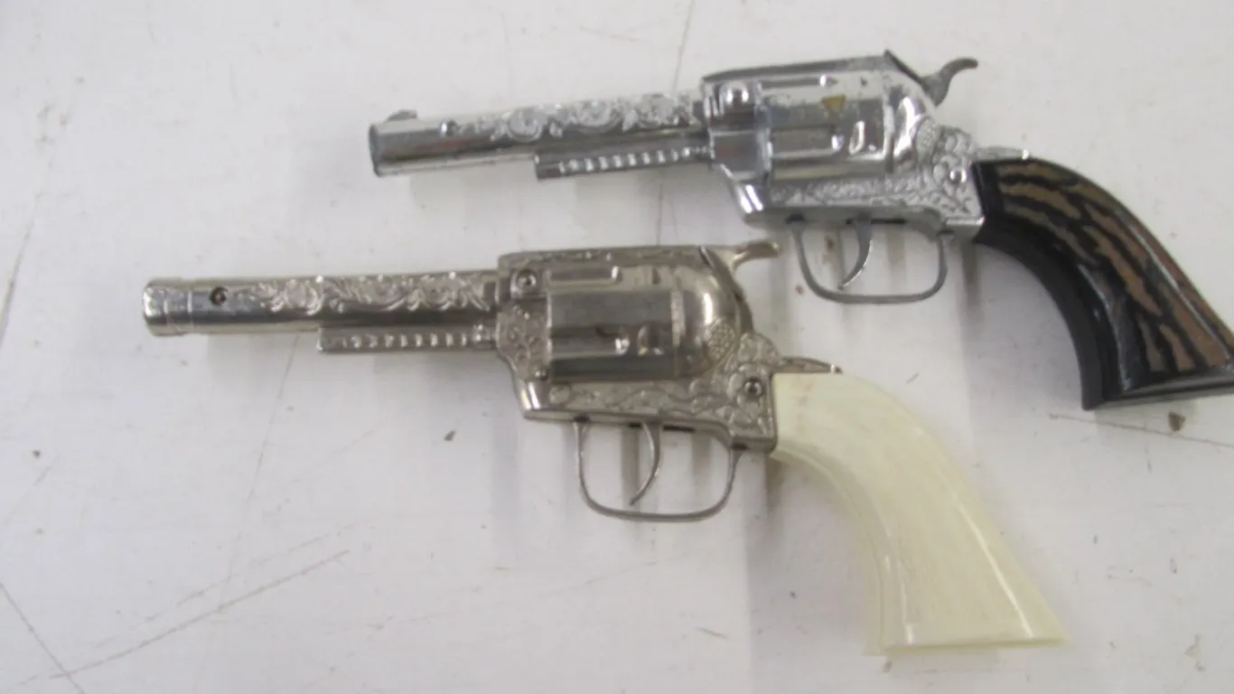 (2) Toy Revolvers
