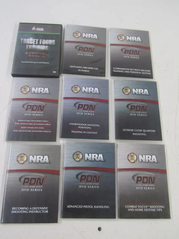 (8) NRA Personal Defense Network DVDs