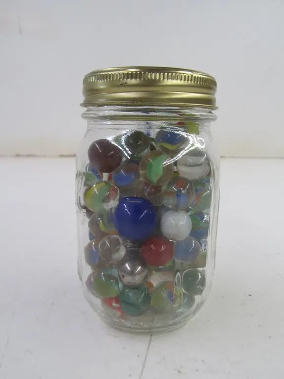 Jar Full Of Assorted Marbles