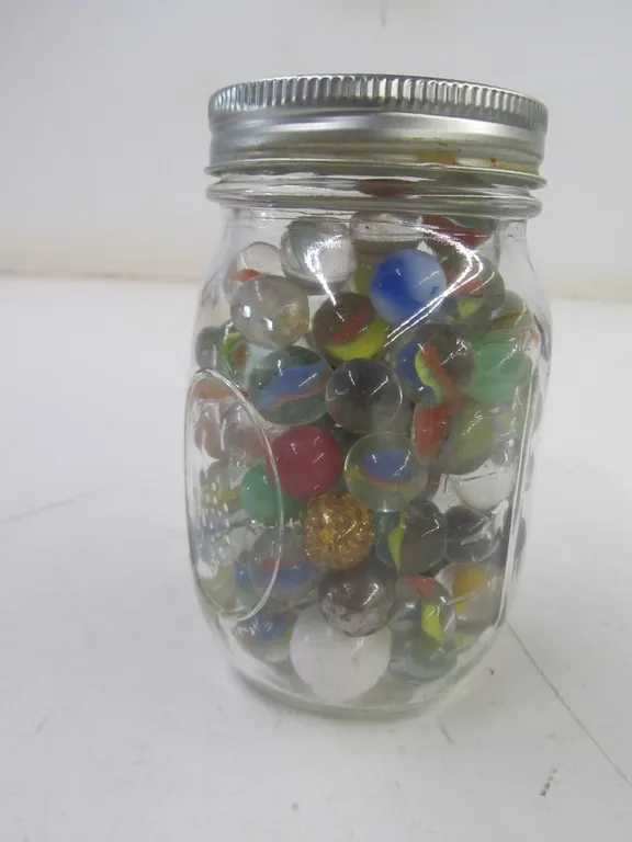 Jar Full Of Assorted Marbles